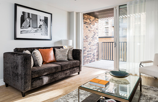 A living area at a flat for sale in London by Galliard Homes.