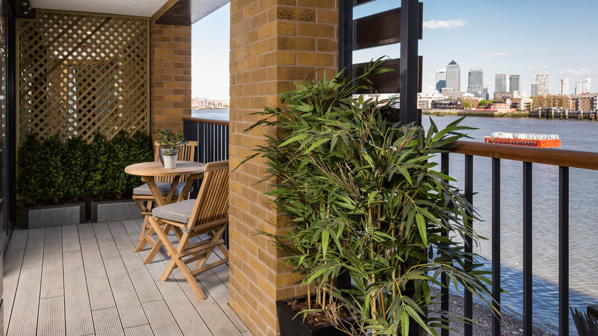Balcony with views of the River Thames and Canary Wharf at the Wapping Riverside show apartment, ©Galliard Homes.