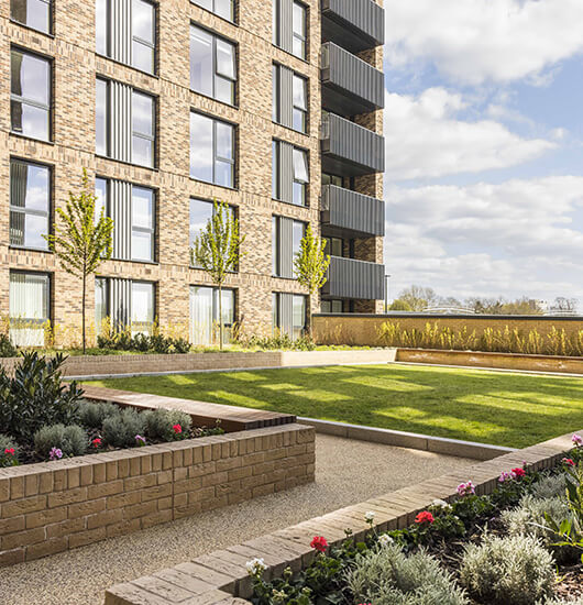 A green communal space at Wimbledon Grounds by Galliard Homes
