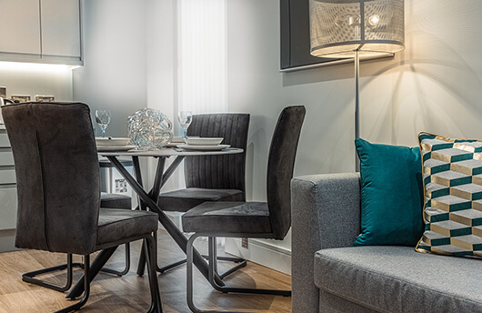 A living and dining area at a Timber Yard show apartment in Birmingham.