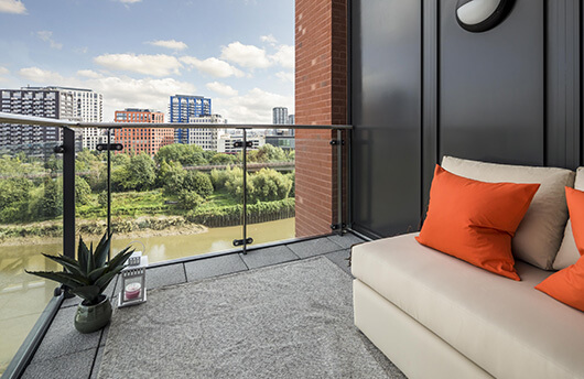 A balcony at Orchard Wharf overlooking the River Lea in London Docklands