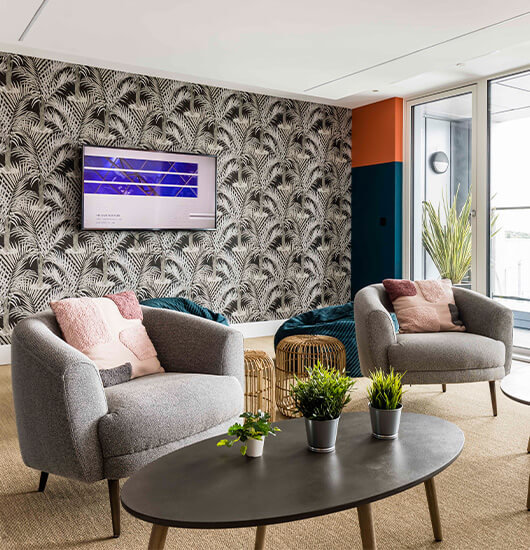 A seating area within the communal lounge at Westgate House, Ealing