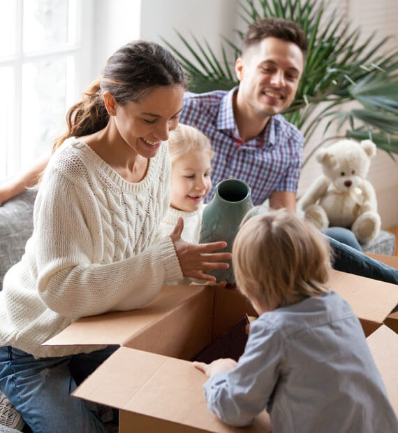 A family moving in to their new home