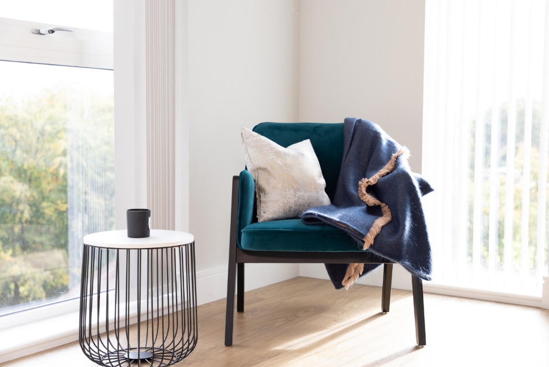 A picture containing indoor, floor, furniture, leather
Description automatically generated