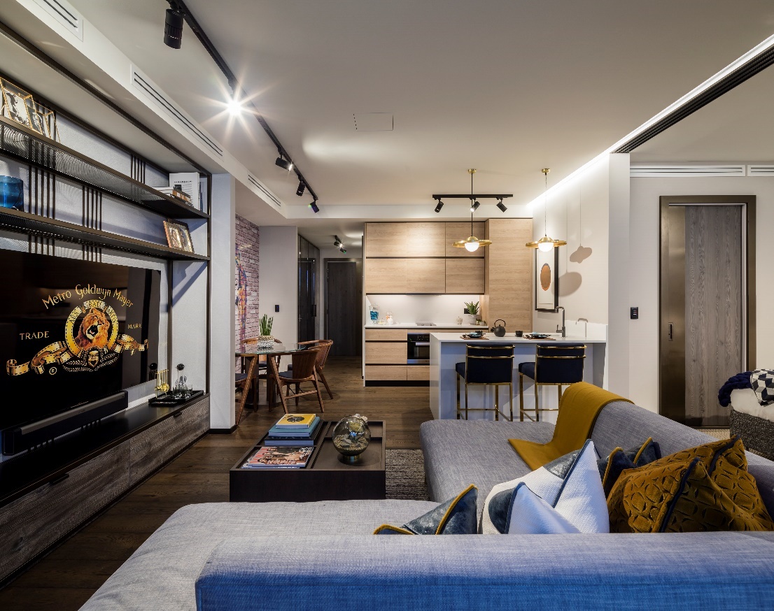A living room with a fireplace
Description automatically generated with medium confidence