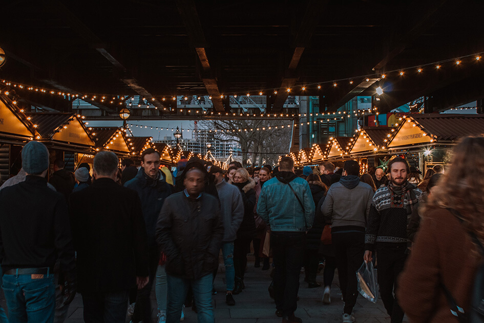 People walking through Southbank Centre Winter Market