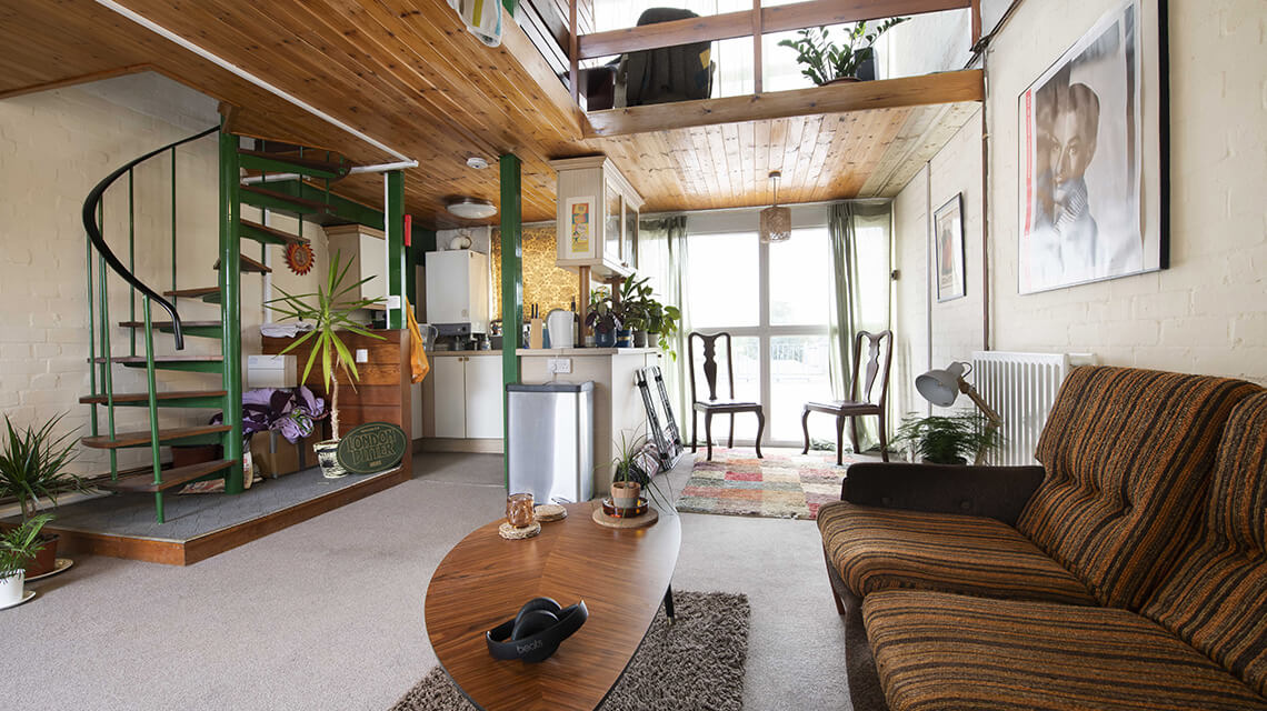 The living and kitchen area at an apartment in Leegate Shopping Centre