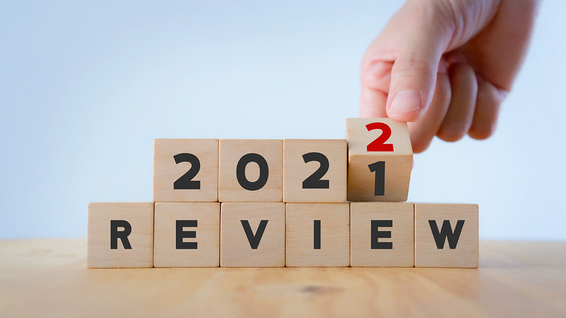 Wooden blocks reading '2021 Review'