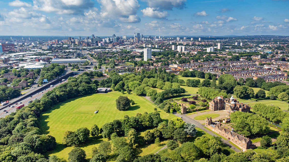 An aerial view of land outside of a city.