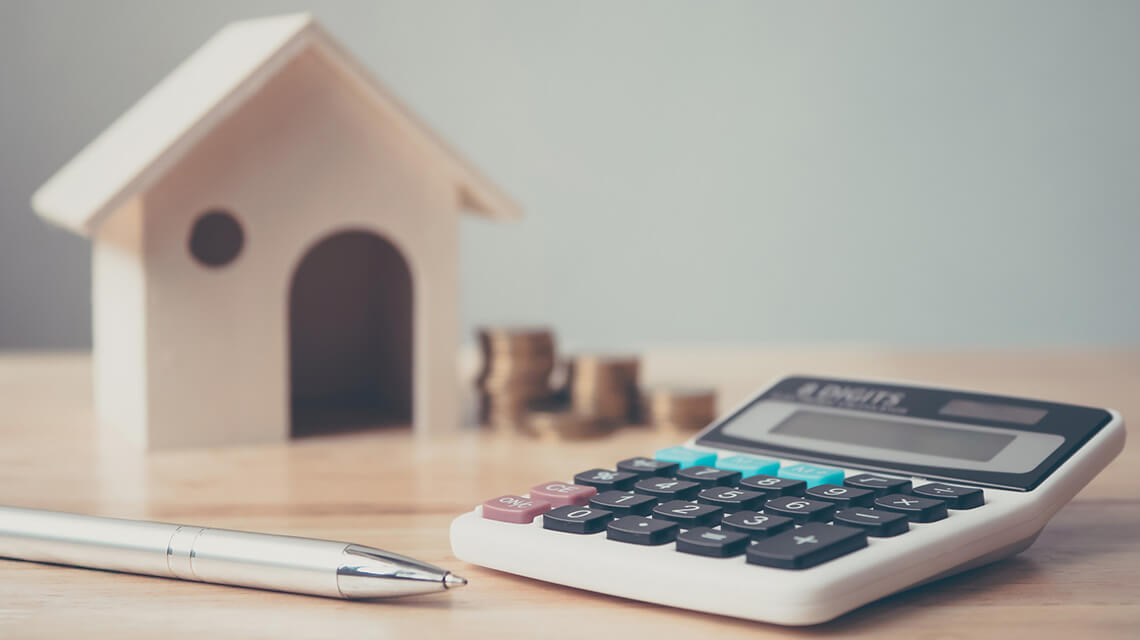A model house and calculator A model house and calculator