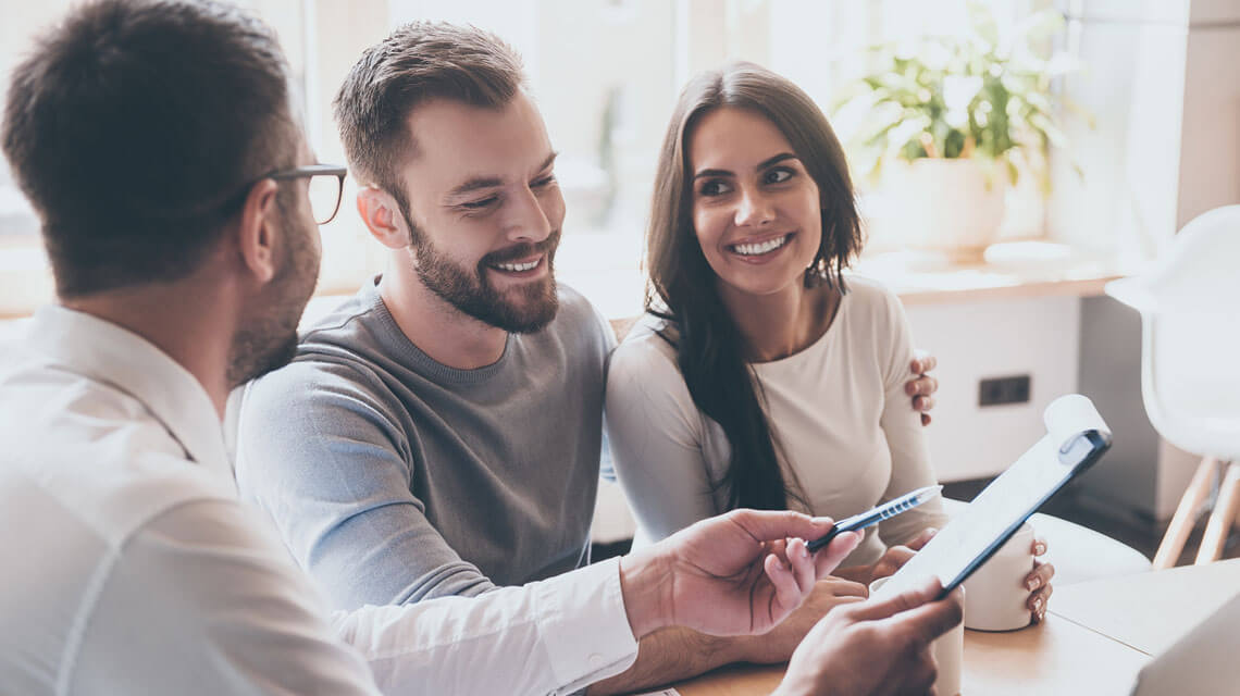 First-time buyers speaking with their mortgage broker