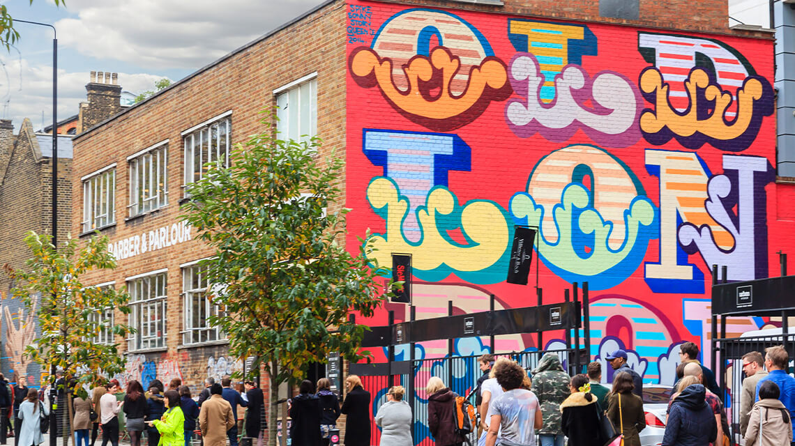 Street art on a busy street in Shoreditch, East London