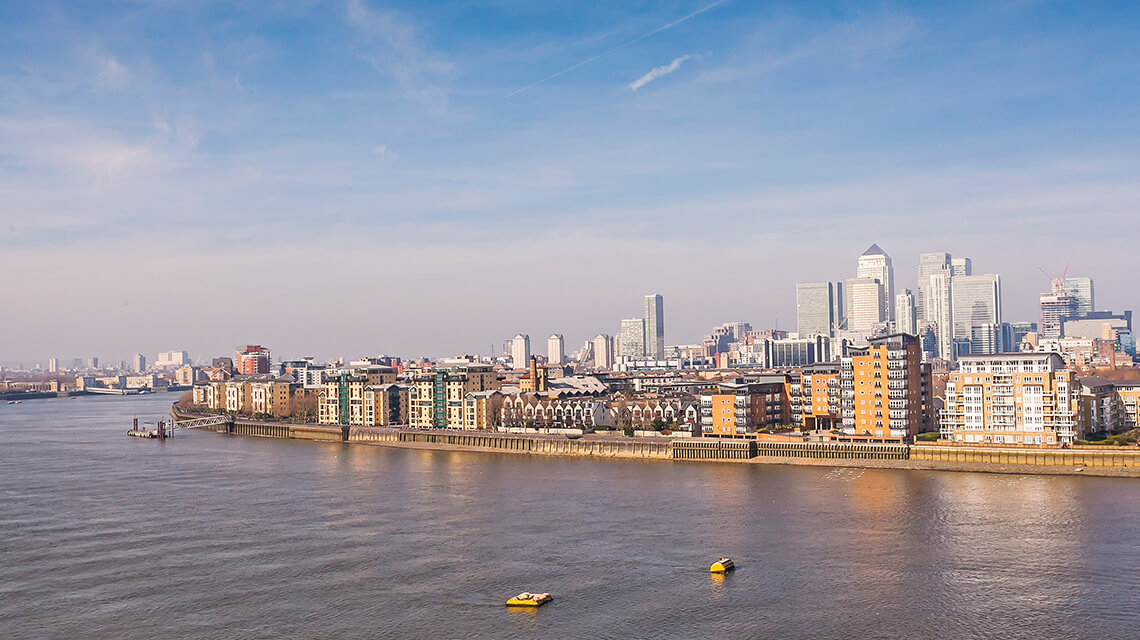 A skyline view over the River Thames of Canary Wharf