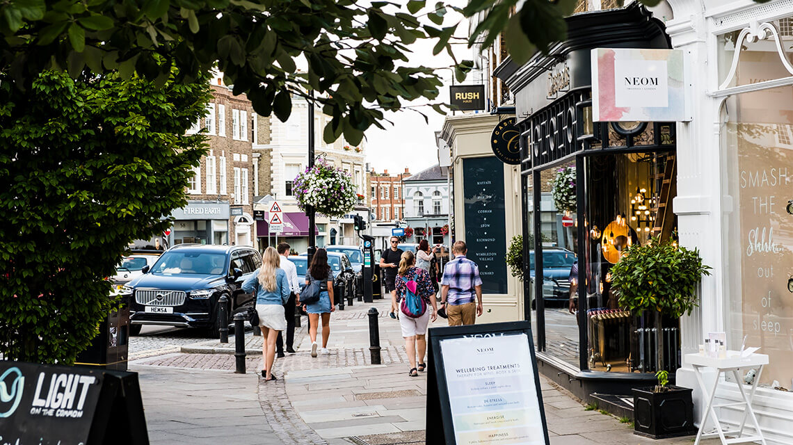 A street in Wimbledon with shops.