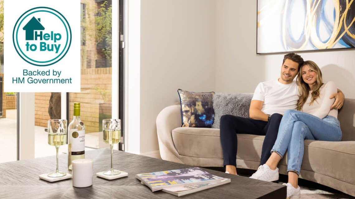 Couple sitting on the sofa of their Wimbledon Grounds apartment