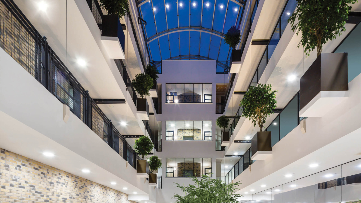 Internal atrium and winter garden at Carlow House, ©Galliard Homes.