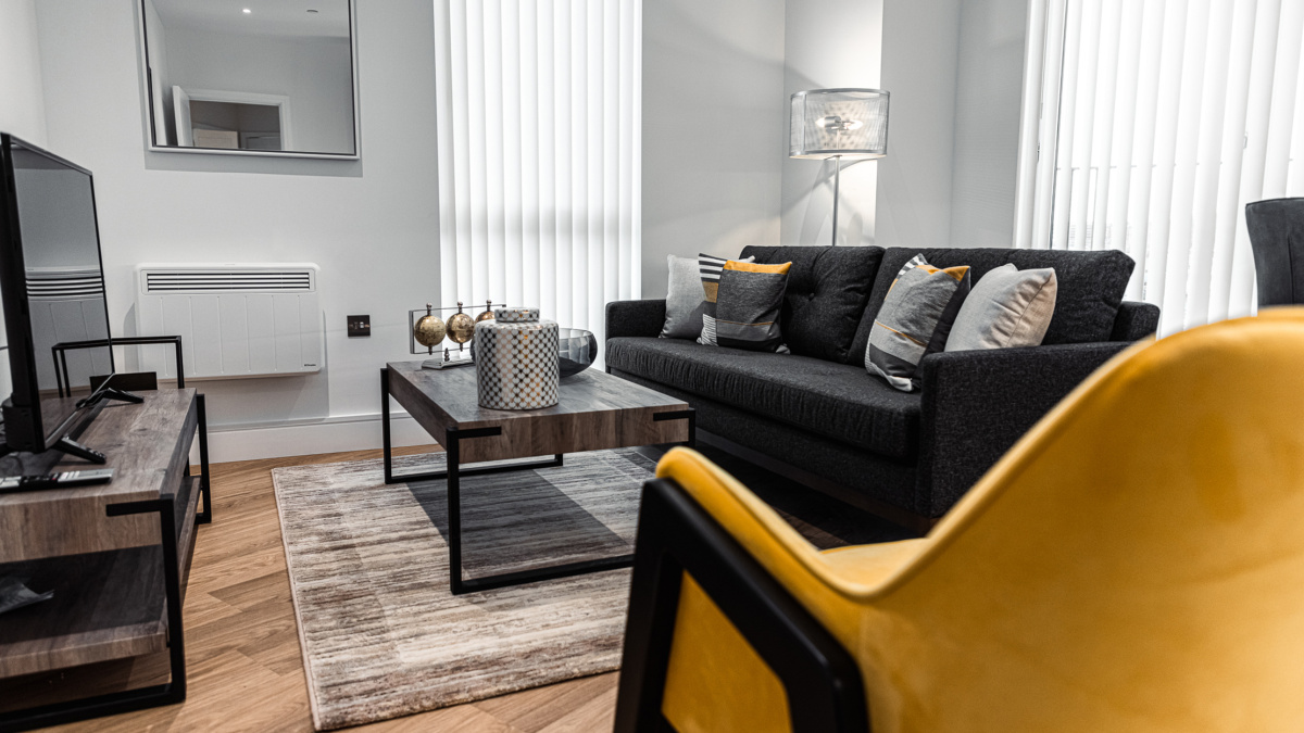 Open-plan living, kitchen and dining area at a Timber Yard apartment, ©Galliard Homes.