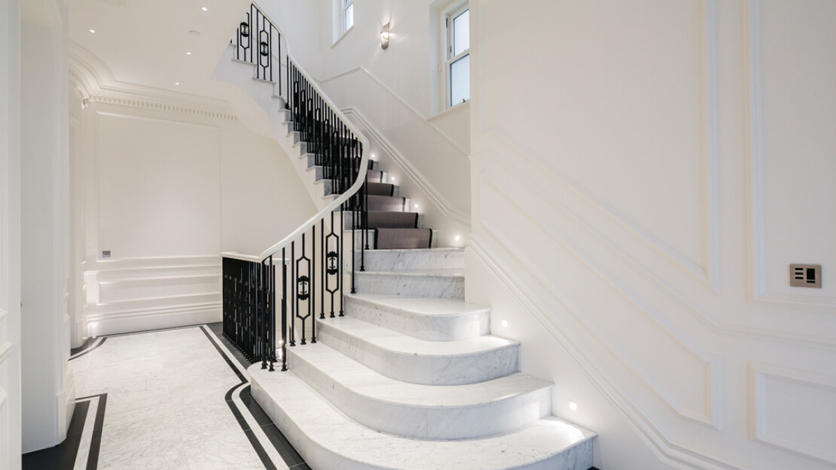 Hallway and staircase at 42 Belsize Park, ©Galliard Homes.