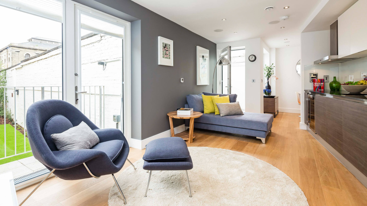 Open-plan living and kitchen area at Merryweather House, ©Galliard Homes.