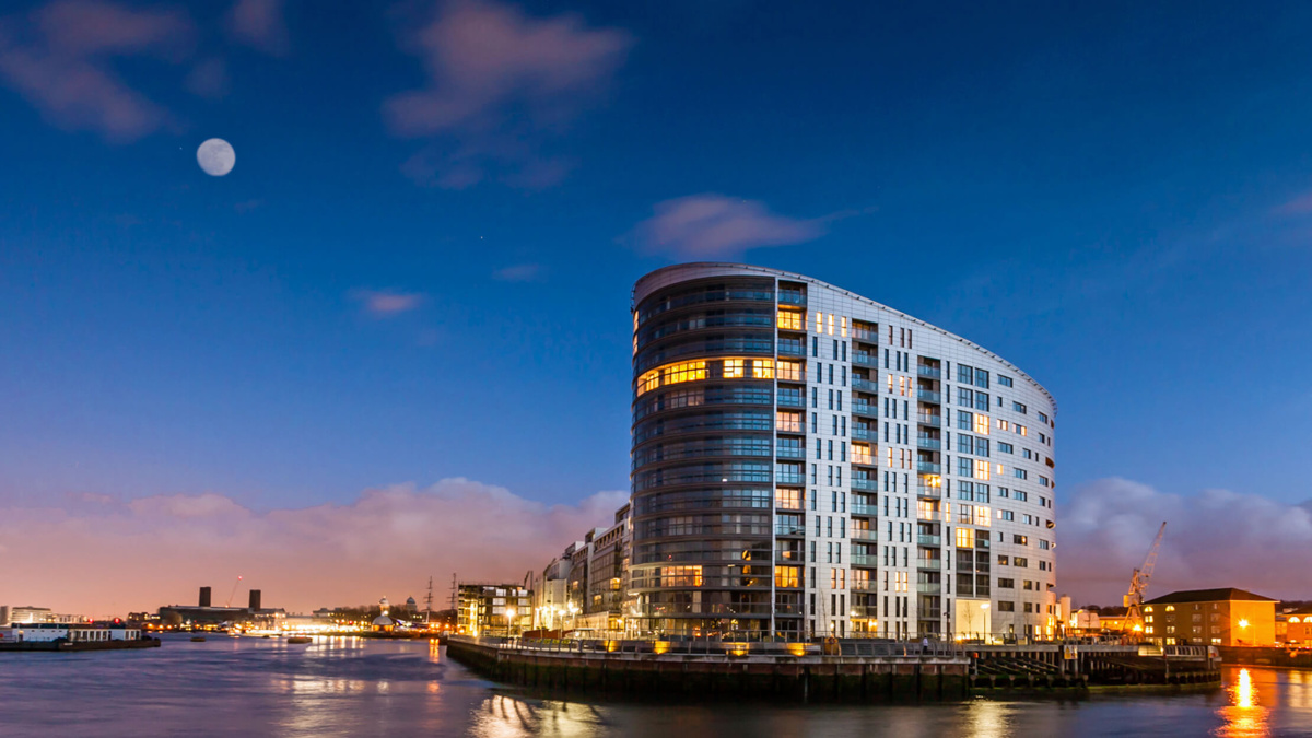 New Capital Quay exterior at night, ©Galliard Homes.