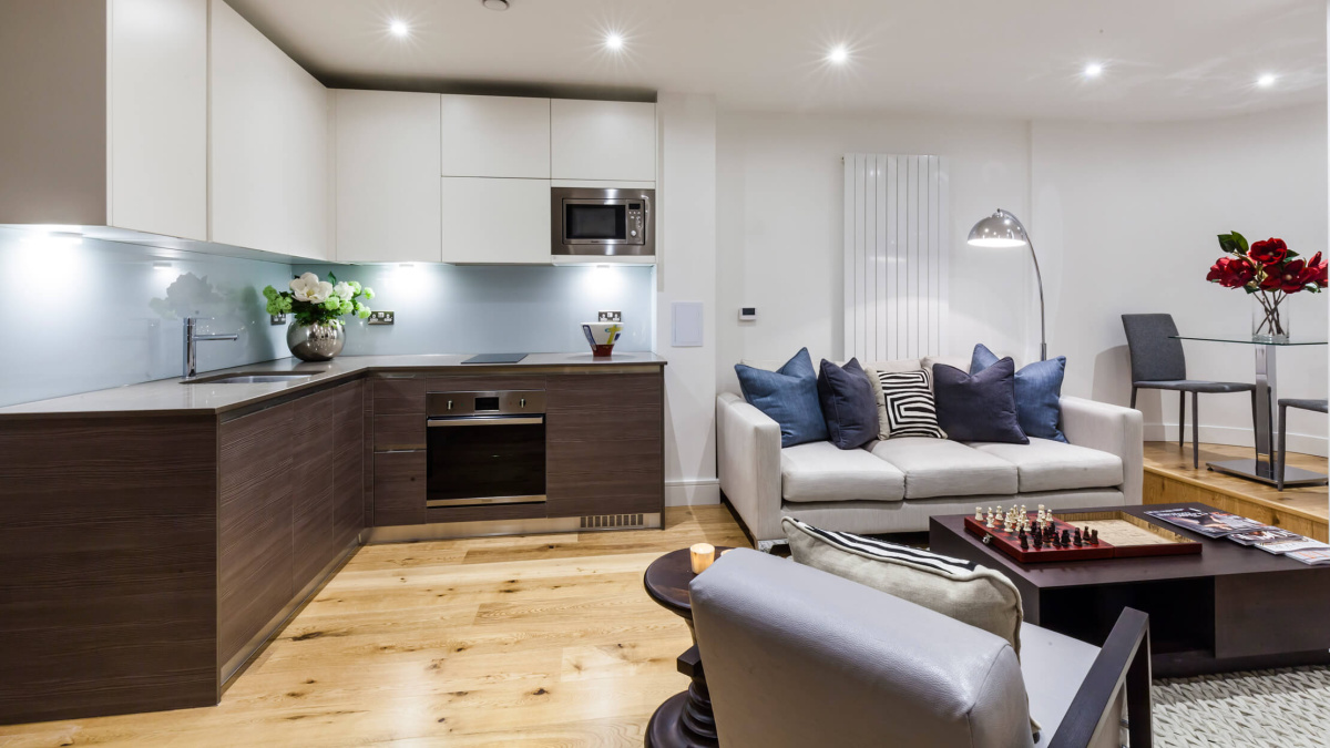 Open-plan kitchen, living and dining area at a Riverdale House studio show apartment, ©Galliard Homes.