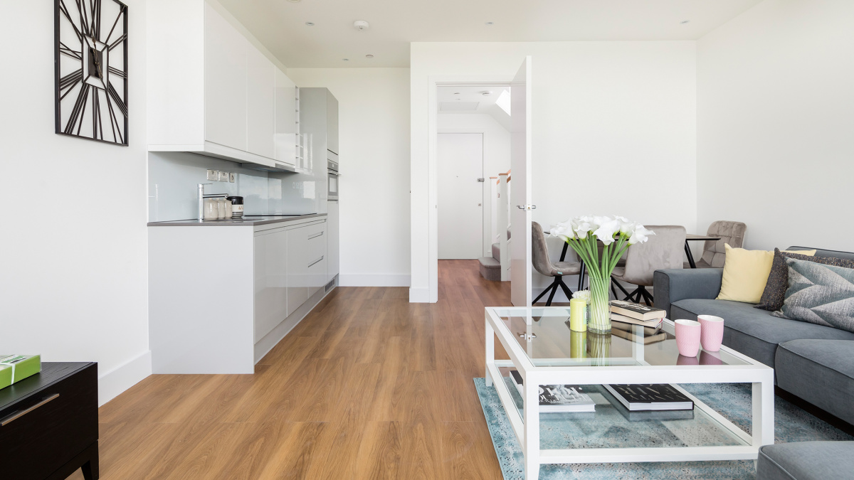 Kitchen and living area at an Atria loft apartment, ©Galliard Homes.