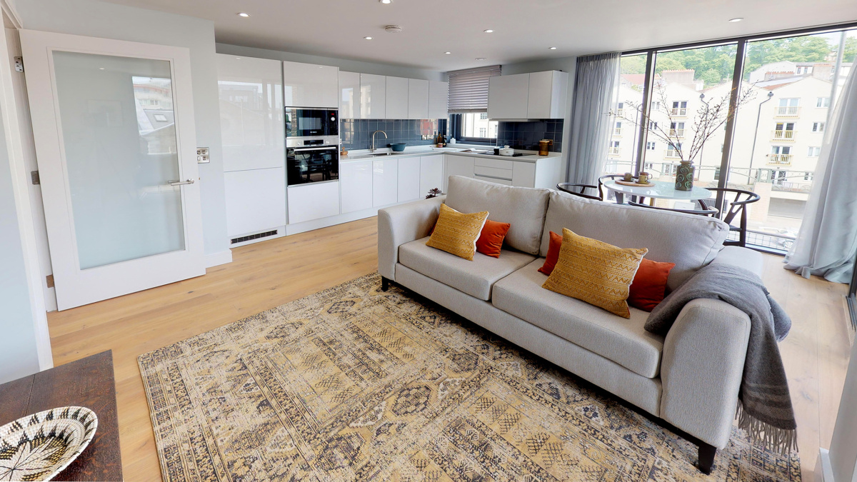 Open-plan kitchen and living area at the Brandon Yard show apartment, ©Acorn Property Group.