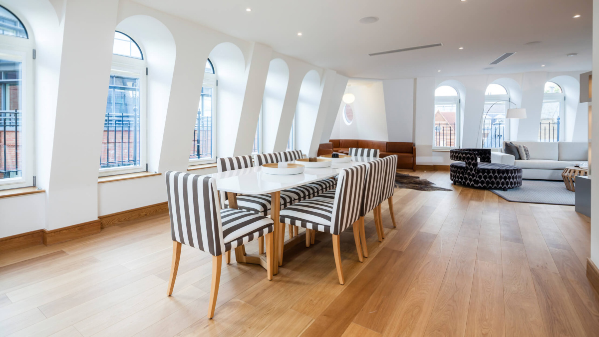 Living and dining room at a Ludgate Broadway penthouse apartment, ©Galliard Homes