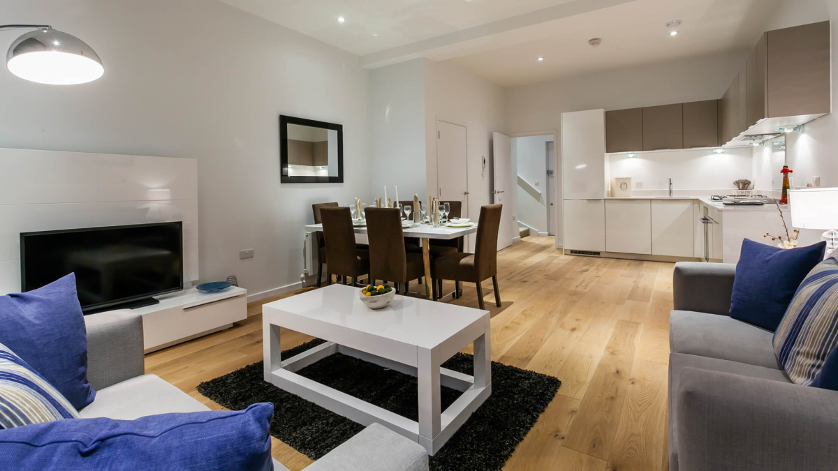 Living and kitchen area in a show apartment at the Tool Works, ©Galliard Homes.