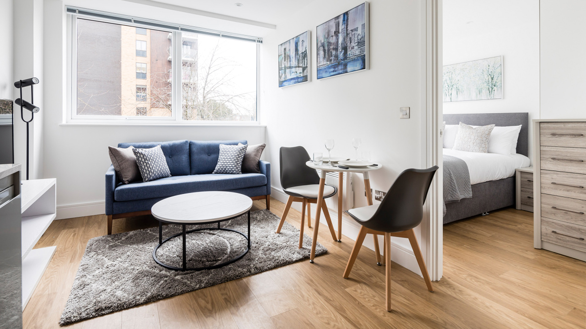 Open-plan kitchen and living area at a Papermill House apartment, ©Galliard Homes.