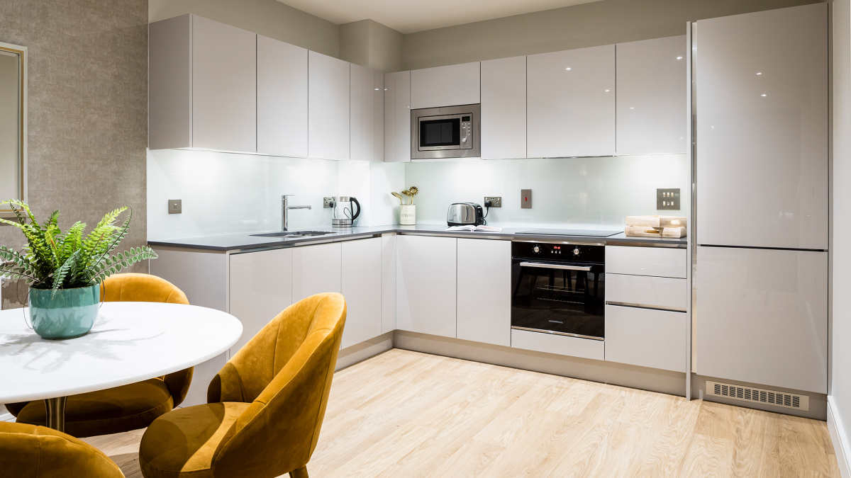 Kitchen and dining area at a Wimbledon Grounds apartment, ©Galliard Homes.