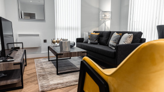 Open-plan living, kitchen and dining area at a Timber Yard apartment, ©Galliard Homes.