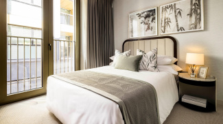 Bedroom at a TCRW SOHO apartment ©Galliard Homes.