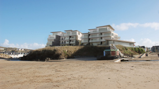 Exterior of The Dunes and Perranporth Beach, computer generated imaged intended for illustrative purposes only, ©Acorn Property Group.