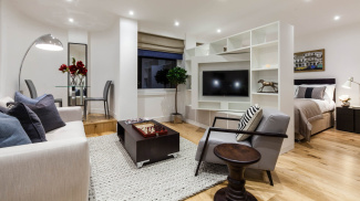 Living and bedroom area at a Riverdale House studio show apartment, ©Galliard Homes.