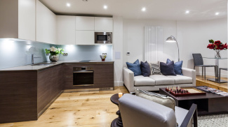 Open-plan kitchen, living and dining area at a Riverdale House studio show apartment, ©Galliard Homes.