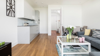 Kitchen and living area at an Atria loft apartment, ©Galliard Homes.