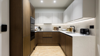 Kitchen area at an Arena Quayside duplex apartment, ©Galliard Homes.

