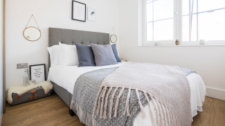 Bedroom area at a Pinnacle House show apartment, ©Galliard Homes.