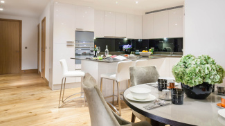 Kitchen and dining area at a Baltimore Wharf show apartment, ©Galliard Homes.