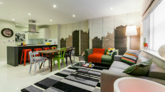 Open-plan kitchen, living and dining room at a Rampart Street show apartment, ©Galliard Homes.