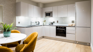 Kitchen and dining area at a Wimbledon Grounds apartment, ©Galliard Homes.