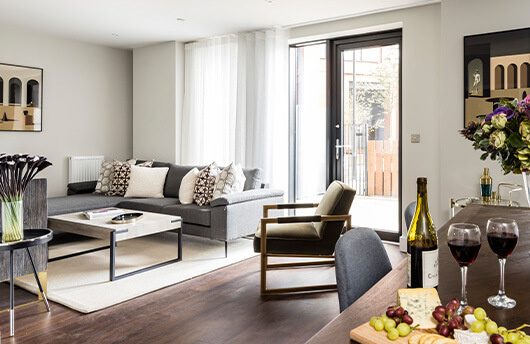 A living and dining area at Orchard Wharf