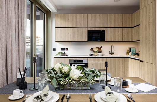 A kitchen and dining area in a London flat for sale by Galliard Homes