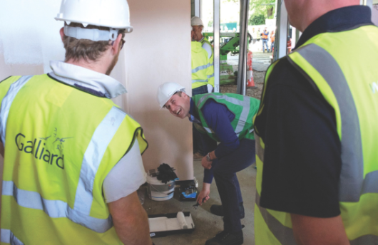 Prince William with DIY SOS and Galliard Homes at the new community hub near the site of Grenfell Tower
