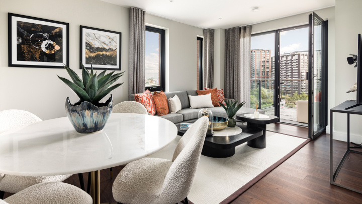 Open-plan living and dining area at an Orchard Wharf apartment, ©Galliard Homes.