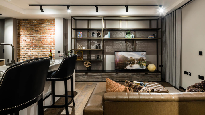Open-plan living room of a one-bedroom apartment at The Stage, ©Galliard Homes.