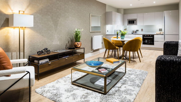 Open-plan kitchen, living area at a Wimbledon Grounds apartment, ©Galliard Homes.