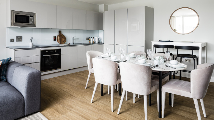Open-plan kitchen, living area at a Wimbledon Grounds apartment, ©Galliard Homes.