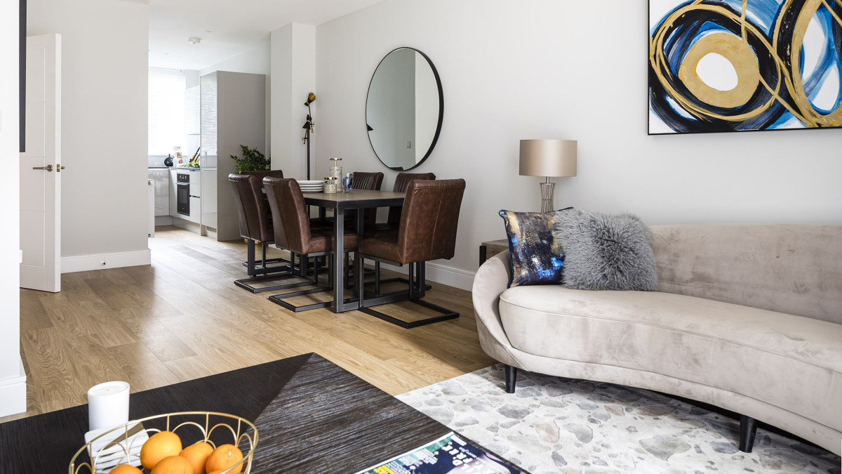 Open-plan kitchen, living and dining area at a Wimbledon Grounds apartment, ©Galliard Homes.